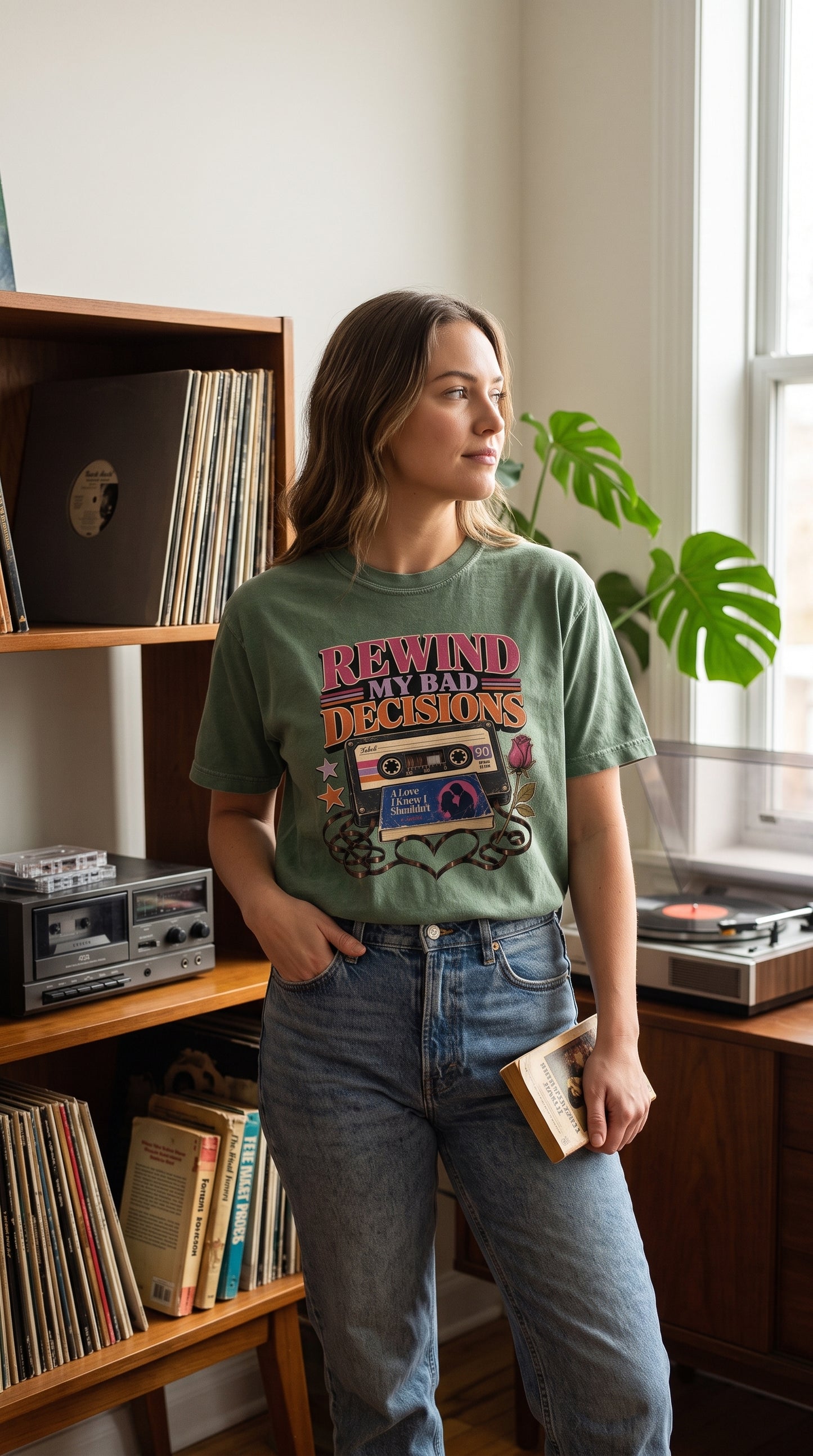 For readers who would happily rewind and make the same fictional mistakes again. This retro cassette-inspired book lover shirt features vintage typography, an old-school tape, romance novel, rose, stars, and heart-shaped cassette ribbon. Perfect for romance readers, nostalgic book lovers, BookTok fans, and anyone with questionable taste in fictional relationships. #RetroBookish #RomanceReader #BookLoverShirt #BookTokStyle #ReaderGift