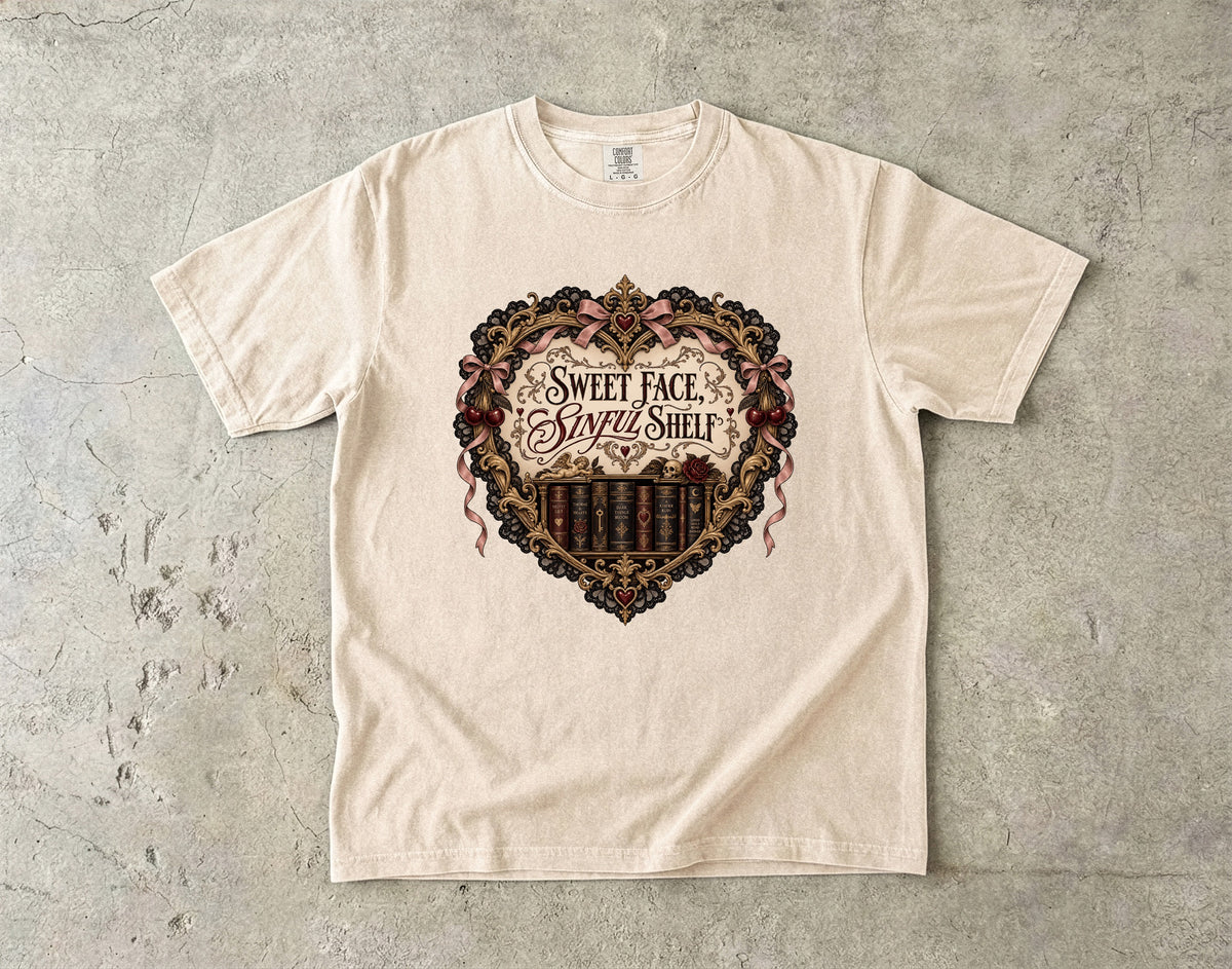 A cream-colored short-sleeve t-shirt with a vintage-style graphic of a heart and a bookshelf, featuring the text 'SWEET FACE. Sweetest Shelf.