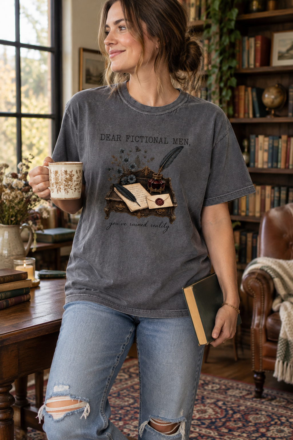 Fictional men ruined reality—and this shirt says what romance readers are already thinking. Featuring a vintage writing desk, handwritten letters, quills, dark florals, and the phrase “Dear Fictional Men, You’ve Ruined Reality,” this Comfort Colors tee makes a fun gift for dark romance readers, romantasy lovers, BookTok fans, and book club friends. Available in six colors. #DarkRomance #BookishShirt #ReaderGift