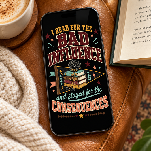 A black smartphone lying on a brown leather chair, displaying a graphic design with the text 'I READ FOR THE BAD INFLUENCE and stayed for the CONSEQUENCES' around a stack of books and a rose. A cup of coffee, a knit sweater, and an open book are visible in the scene.