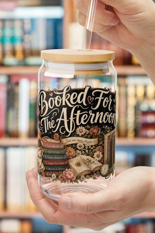 Your favorite drink and your favorite book belong together. 📚🩷 The Booked for the Afternoon personalized glass cup is perfect for romance readers, BookTok fans, and anyone who loves cozy cottagecore vibes. Featuring a charming basket of books, vintage teacups, fresh strawberries, butterflies, blooming flowers, and a soft pink bow, this 16 oz glass is perfect for iced coffee, tea, lemonade, or your favorite refreshing drink. Personalize it with your name for a thoughtful gift that's perfect for book lovers