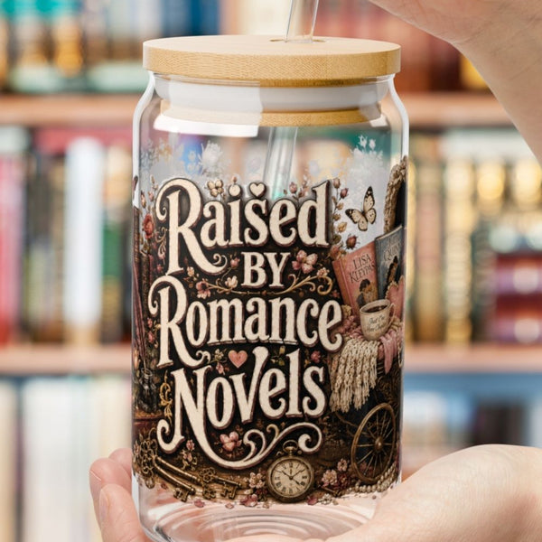 Your iced coffee and your current romance novel are the perfect pair. 🧋📚 The Raised by Romance Novels personalized glass cup features a beautifully detailed vintage design with beloved romance books, antique florals, pearls, lanterns, bows, and a charming baby carriage. Perfect for BookTok readers who love cozy aesthetics and beautifully crafted drinkware. A unique gift for every romance book lover.

#RaisedByRomanceNovels #GlassCup #BookLoverGift #BookTokMadeMeBuyIt #IcedCoffeeLover #RomanceReader #Booki