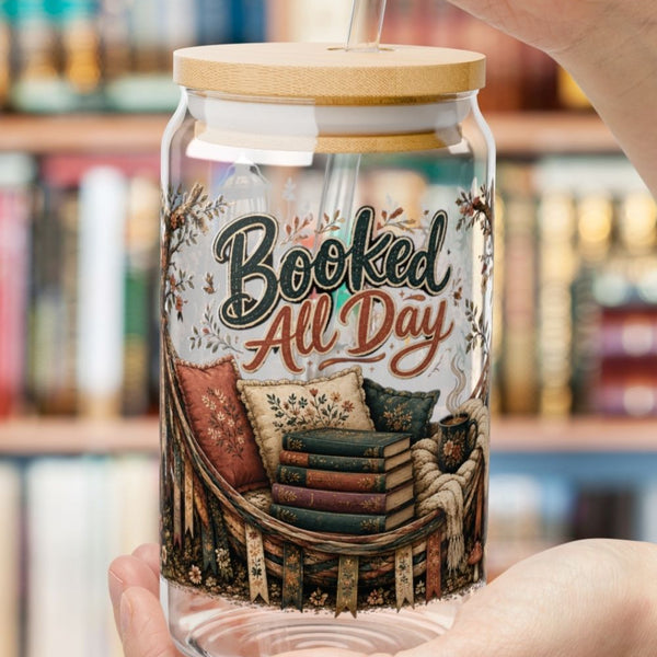 The perfect reading companion starts with iced coffee. ☕📚 The Booked All Day glass cup features a cozy wraparound design with books, coffee, lanterns, florals, and a dreamy reading hammock. Perfect for iced coffee, tea, or cold brew while diving into your latest romance novel or BookTok recommendation.

#BookedAllDay #GlassCup #BookLoverCup #BookTokGift #IcedCoffeeCup #RomanceReader #CoffeeAndBooks #BookishDrinkware #ReaderLife #LiteraryGift