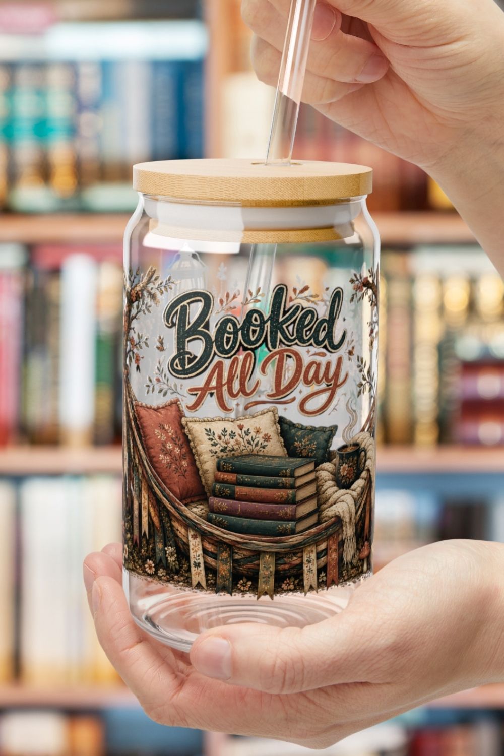 The perfect reading companion starts with iced coffee. ☕📚 The Booked All Day glass cup features a cozy wraparound design with books, coffee, lanterns, florals, and a dreamy reading hammock. Perfect for iced coffee, tea, or cold brew while diving into your latest romance novel or BookTok recommendation.

#BookedAllDay #GlassCup #BookLoverCup #BookTokGift #IcedCoffeeCup #RomanceReader #CoffeeAndBooks #BookishDrinkware #ReaderLife #LiteraryGift