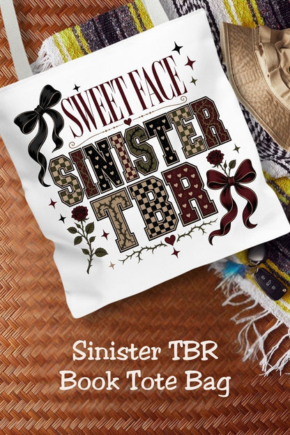 A bookish tote for readers with a sweet style and a seriously sinister TBR. This Sweet Face Sinister TBR Tote Bag features bold collegiate lettering, checkerboard accents, roses, thorny vines, hearts, and dramatic bows in burgundy, black, cream, and muted olive tones. Perfect for dark romance readers, romantasy fans, BookTok lovers, TBR addicts, bookstore trips, library hauls, and book club days. Save this as a fun book lover gift, reader tote, dark romance accessory, or bookish outfit essential.

#BookLove