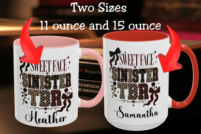 Two white ceramic mugs with pink and red interiors and handles, shown side by side with text reading 'Two Sizes 11 ounce and 15 ounce' and red arrows pointing to each mug. The mugs have black and brown decorative text reading 'Sweet Face Sinister TBR' with names Heather and Samantha below.