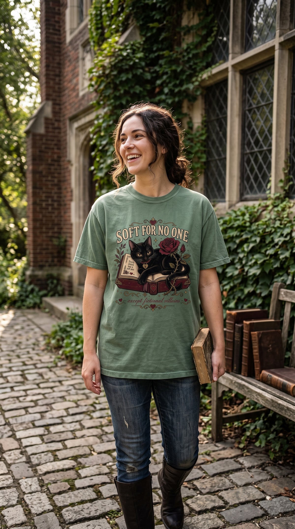 Soft for no one… except fictional villains. This gothic cat book lover shirt features a sleek black cat lounging on an open book surrounded by burgundy roses, thorny vines, hearts, and antique gold details. A perfect gift for cat-loving readers, dark romance fans, villain lovers, romantasy readers, and BookTok friends with a weakness for fictional red flags. #CatBookLover #DarkRomance #VillainRomance #BookTokGift #BookishShirt