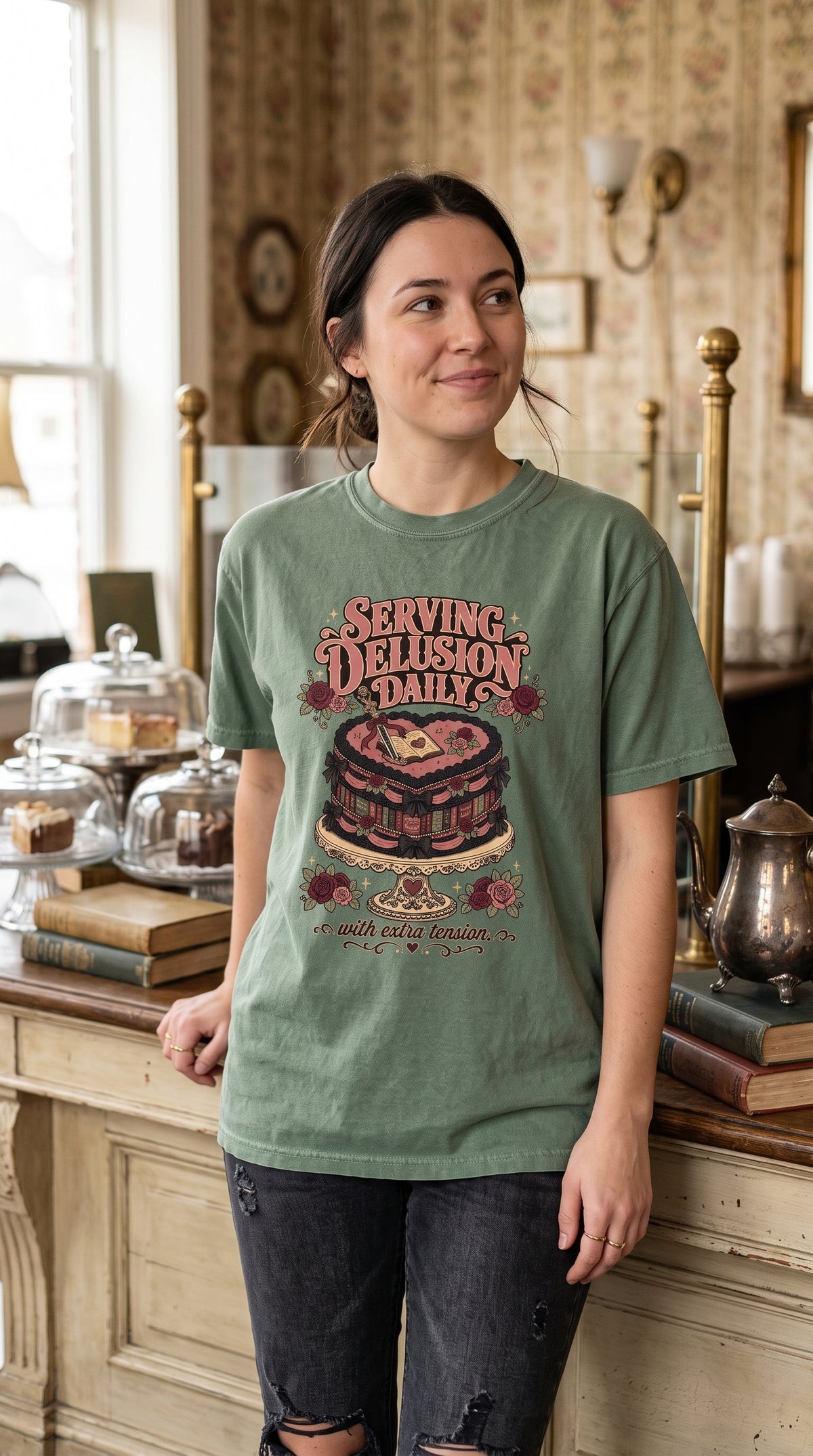 Serving reader delusion daily with a generous helping of extra tension. This playful dark romance shirt features a heart-shaped book cake decorated with black bows, roses, tiny romance novels, and vintage details. Perfect for BookTok readers, book club friends, morally gray hero fans, romantasy lovers, and anyone who treats fictional drama as self-care. #ServingDelusion #RomanceReader #BookTokShirt #BookishHumor #DarkRomance