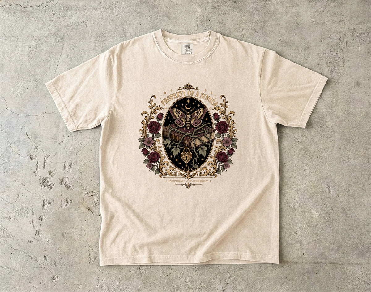 A cream-colored short-sleeve t-shirt with a detailed gothic-style graphic print featuring a clockwork owl, roses, and the text 'TIME IS A LOST CAUSE' on a textured gray concrete background.