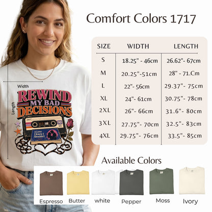 A woman wearing a white graphic T-shirt with a retro cassette design and the text 'REWIND MY BAD DECISIONS,' shown beside a size chart for Comfort Colors 1717 and an available colors panel. The shirt graphic includes pink, orange, black, and beige tones.