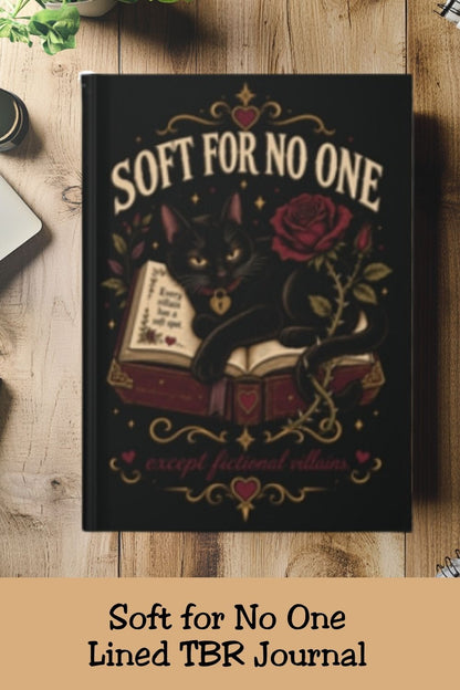 Soft for no one… except fictional villains. This gothic hardcover journal features a black cat resting on an open book, red roses, and antique-gold printed details with a coordinating starry back cover. With 150 lined pages and a matte finish, it’s ready for reading notes, favorite quotes, story ideas, and daily journaling. A thoughtful book lover gift for dark romance readers, romantasy fans, and cat lovers with a soft spot for morally gray characters.