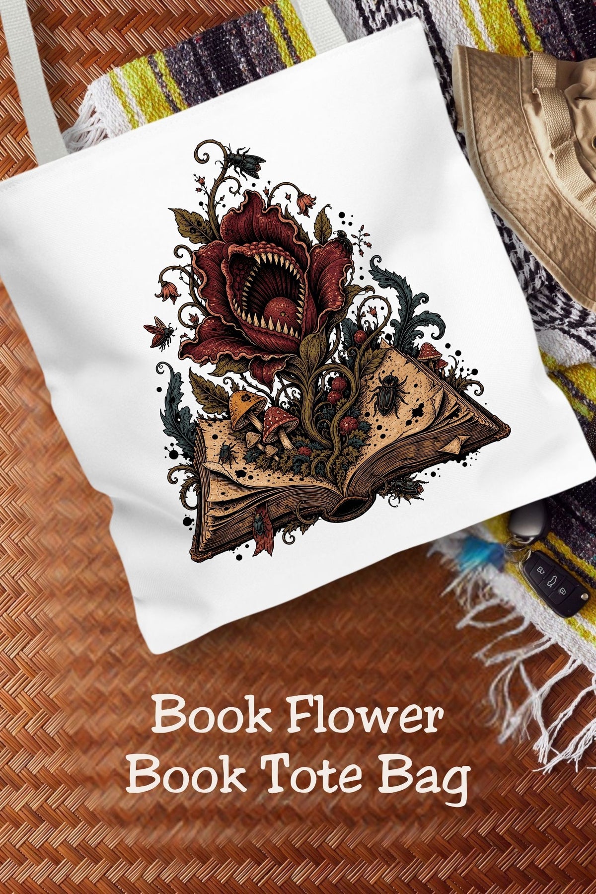 A book bag with a little bite. This gothic book lover tote features a carnivorous burgundy flower growing from an antique-style book, surrounded by mushrooms, beetles, and curling vines. The 16 × 16-inch tote is ready for library trips, bookstore browsing, and book club nights. A thoughtful gift for horror readers, dark fantasy fans, and lovers of unusual botanical art.