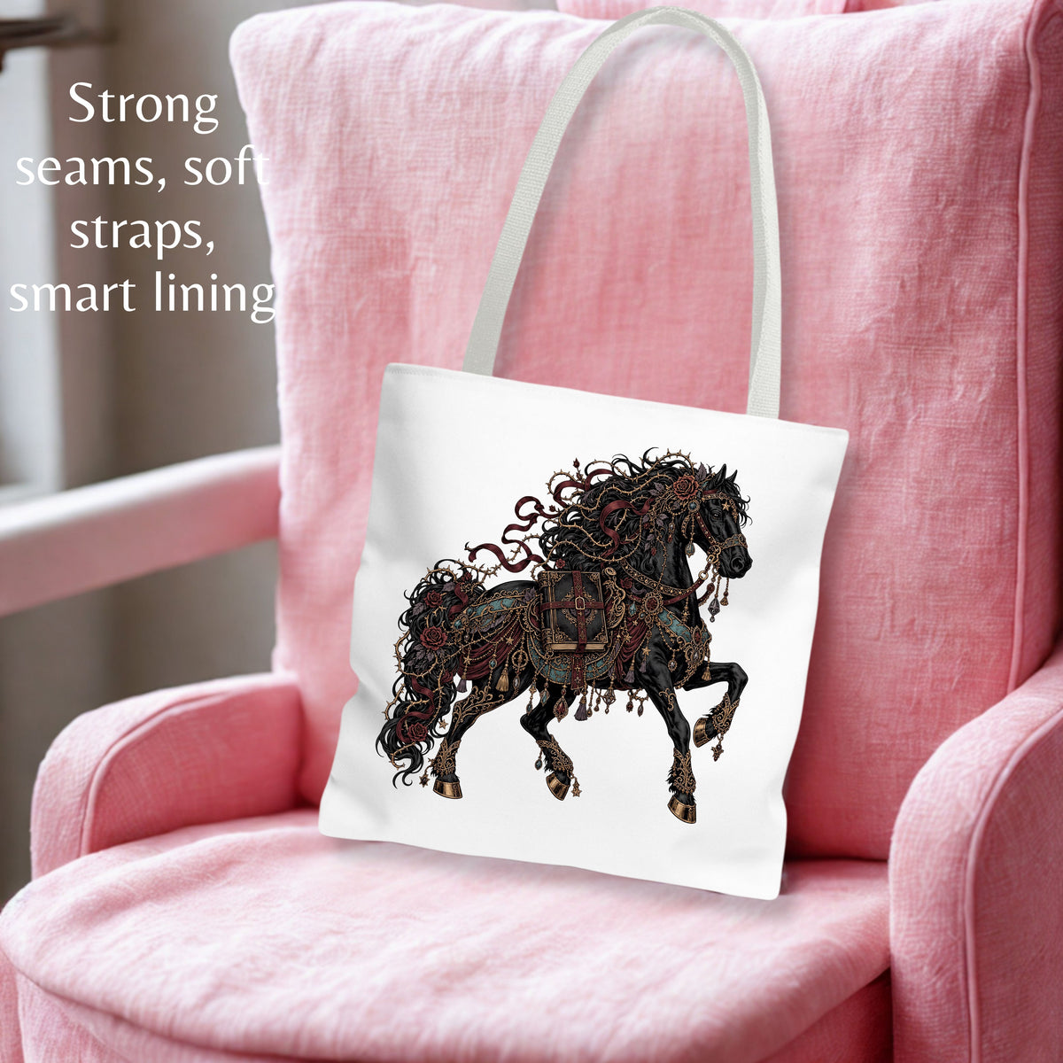 A white canvas tote bag with a detailed graphic of a dark, ornate horse, resting on a pink armchair. The text on the left highlights its features: 'Strong seams, soft straps, smart lining'.