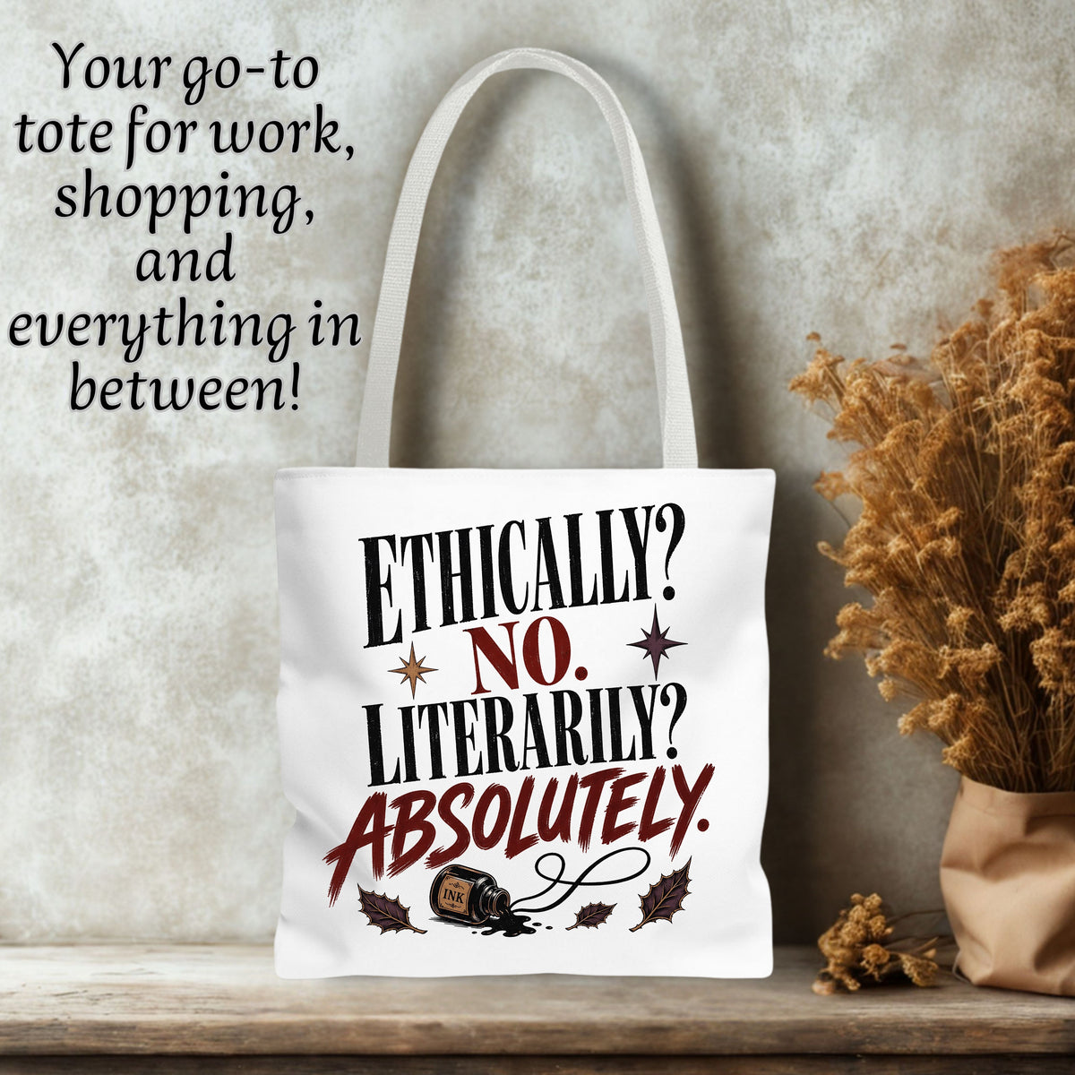 A white canvas tote bag with white shoulder straps stands on a wooden surface against a textured light gray wall. The bag has printed text reading “ETHICALLY? NO.