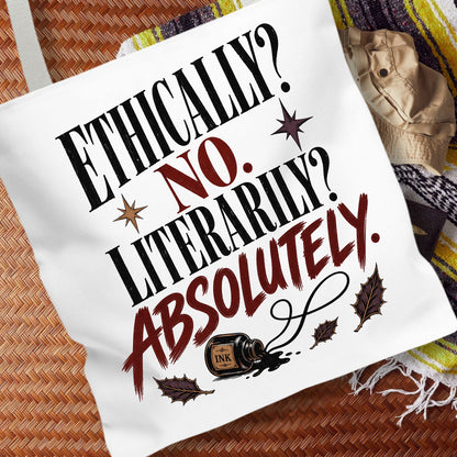 A white canvas tote bag with a printed quote that reads 'ETHICALLY? NO. LITERARILY? ABSOLUTELY.