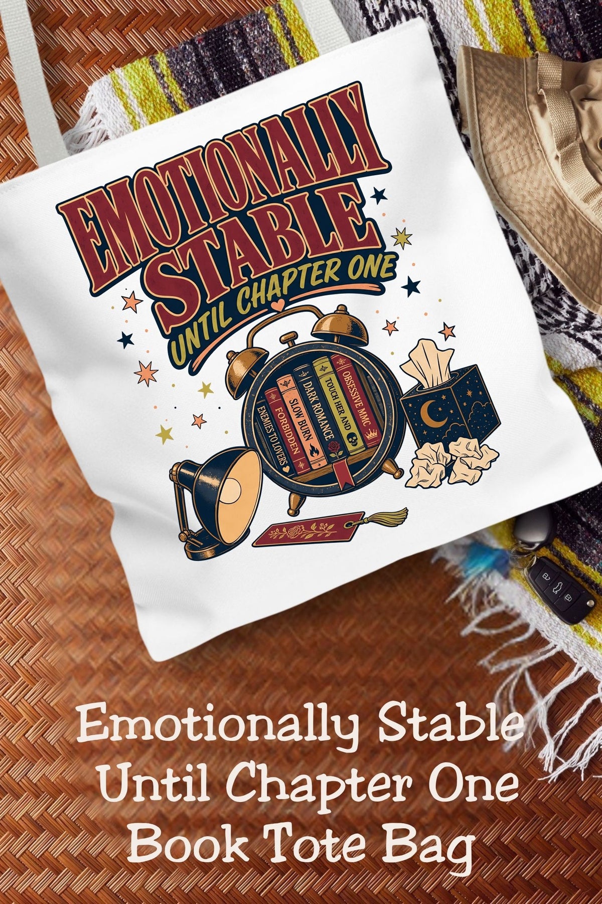 Emotionally stable until chapter one—and then the tissues come out. This funny book lover tote features retro lettering, an alarm clock filled with romance trope books, and cozy reading accessories. The 16 × 16-inch bag carries your current read and everyday essentials for library visits, bookstore trips, and book club nights. A thoughtful gift for romance readers and friends who feel every plot twist.