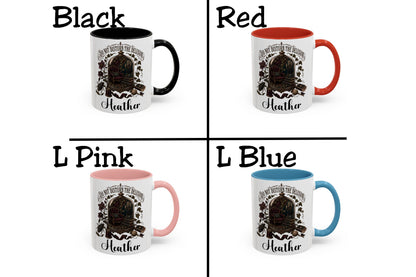 A 2x2 color options grid showing a printed ceramic mug labeled 'Stella' with different handle/interior color variants: Black, Red, L Pink, and L Blue. Each quadrant shows the mug design and text label above it on a white background.