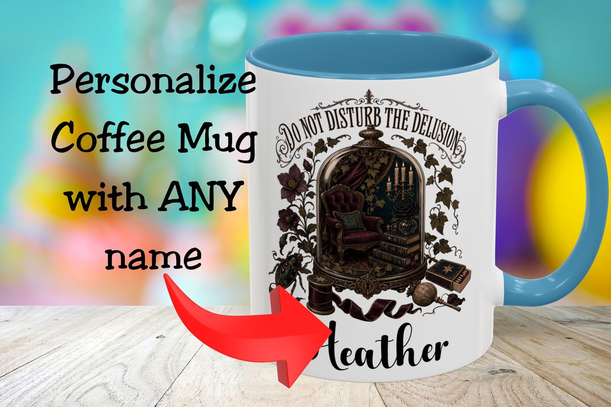 A white coffee mug with a blue interior and handle, featuring a dark gothic illustration of a chair and the text 'Do Not Disturb the Delusion' and 'Leather'. Large text on the left says 'Personalize Coffee Mug with ANY name' with a red arrow pointing to the mug.