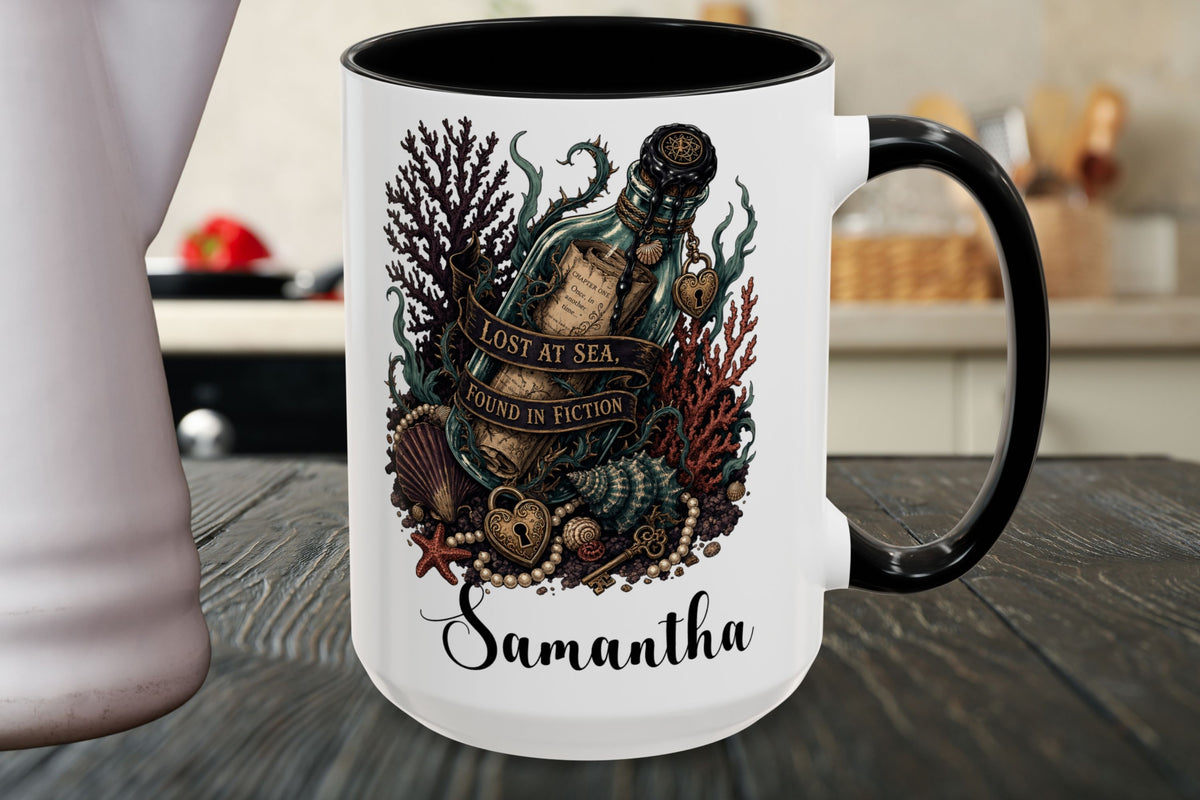 A white ceramic mug with a black handle and black interior, featuring a detailed graphic of an octopus inside a bottle labeled 'LOST AT SEA' surrounded by sea creatures, with the name 'Samantha' printed below, set on a dark wooden table.