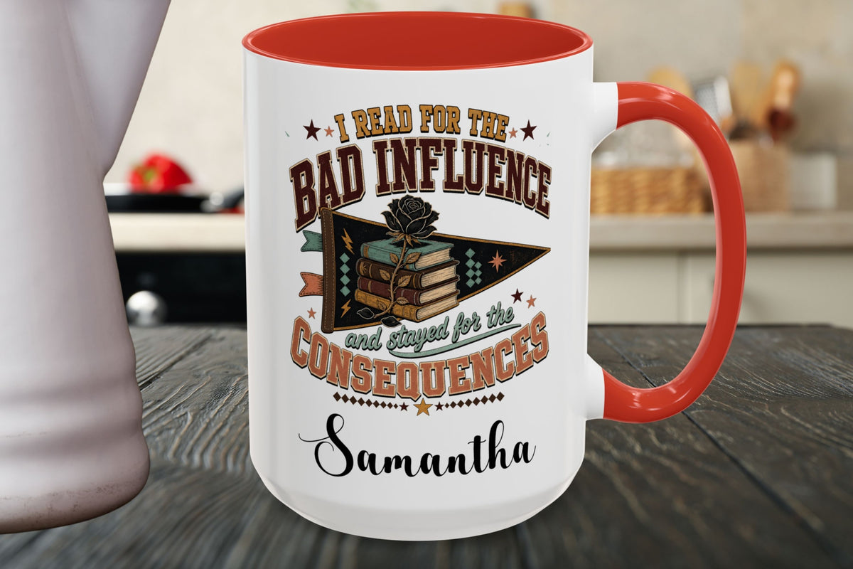 A white ceramic mug with a red handle and interior, featuring a vintage-style book graphic and the text 'I Read For The Bad Influence and Stayed for the Consequences' with the name 'Samantha' printed below, set on a dark wooden table with a blurred kitchen background.