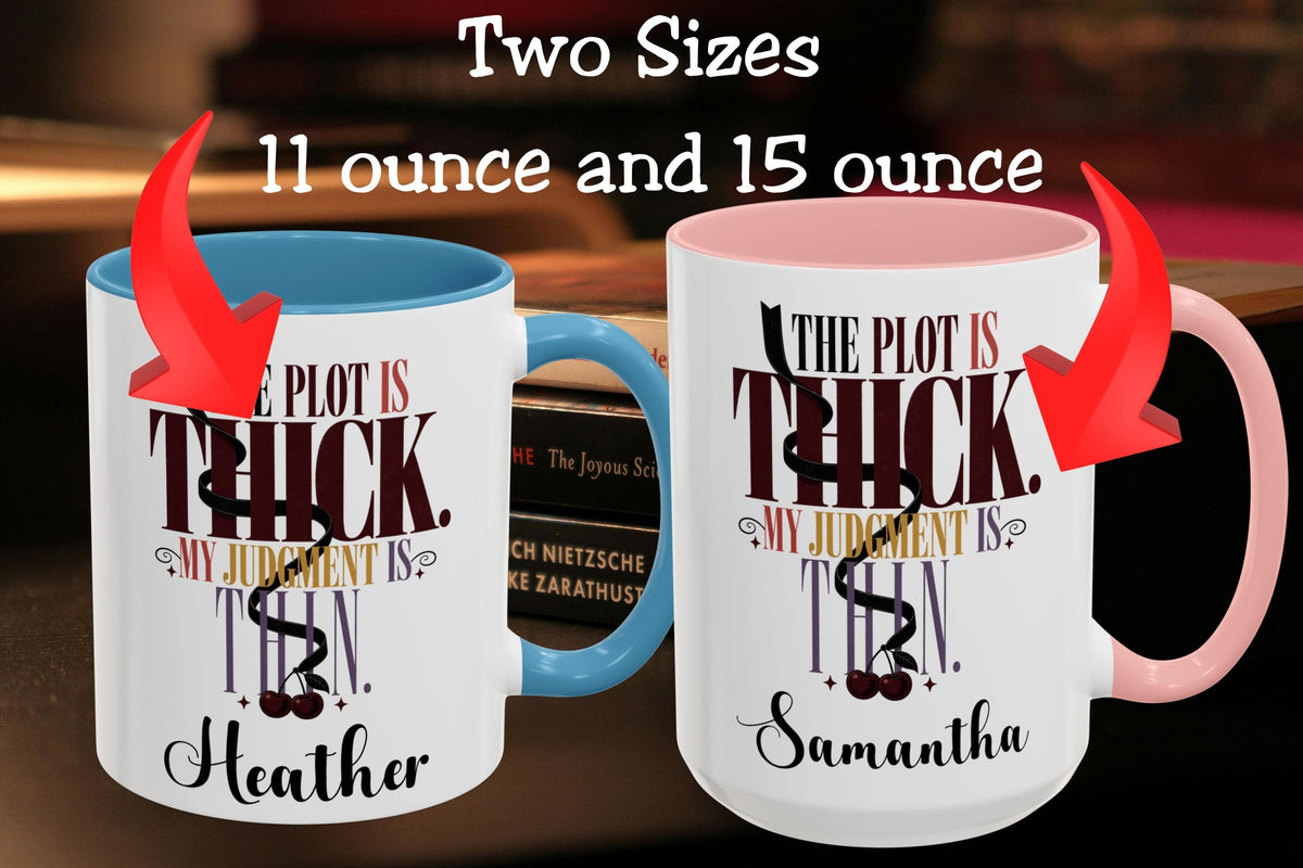 Two white ceramic mugs shown side by side with text reading 'Two Sizes 11 ounce and 15 ounce' and red arrows pointing to each mug. The left mug has a blue handle and interior, and the right mug has a pink handle and interior.