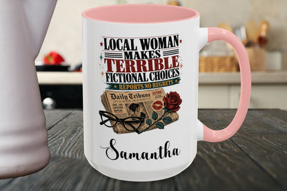 A white ceramic mug with a pink handle and interior, featuring a humorous graphic for fictional writers. The design includes a newspaper, eyeglasses, a red rose, and the text 'LOCAL WOMAN MAKES TERRIBLE FICTIONAL CHOICES REPORTS TO BUGS' above the name 'Samantha'.