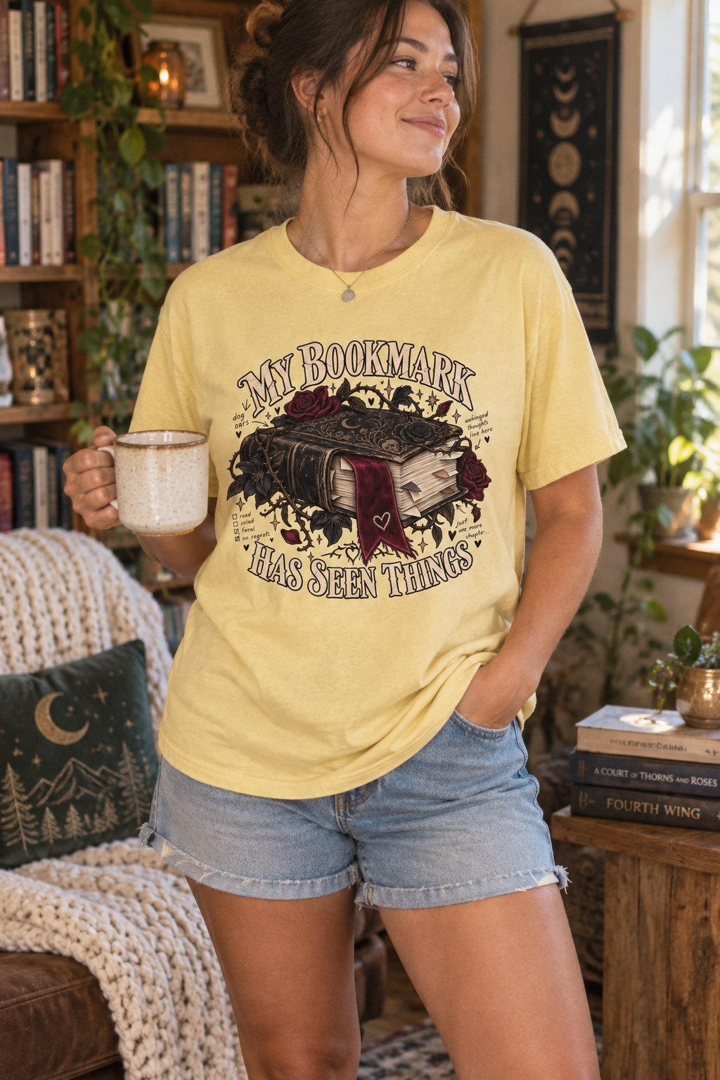 Your bookmark has been through the plot twists, late-night chapters, and scenes you immediately reread. This funny book lover shirt features antique books, burgundy roses, gothic botanical details, and a dramatic ribbon bookmark on a soft Pepper Comfort Colors tee. A fun gift for romance readers, fantasy fans, librarians, book club friends, and devoted bookworms. Perfect for reading days, bookstore visits, author events, and book club nights. Shop through the link in the first comment. #BookLoverShirt #Read
