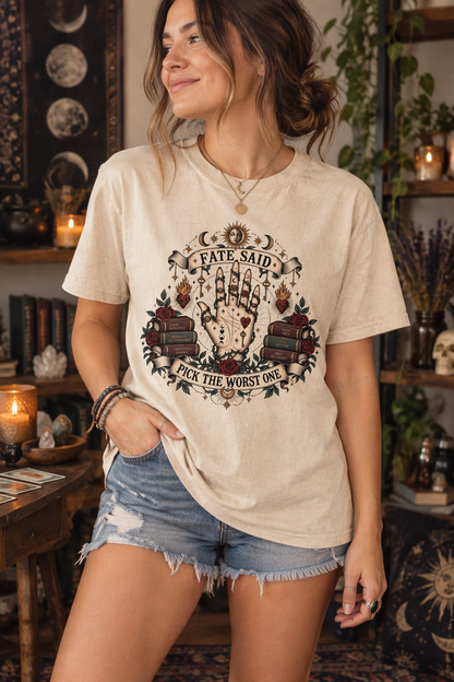 Fate said pick the worst one—and every dark-romance reader understood the assignment. This gothic book lover shirt features a vintage palmistry hand, stacked books, burgundy roses, flaming hearts, keys, moons, stars, and morally questionable reader humor. A fun gift for dark-romance fans, BookTok friends, villain lovers, romantasy readers, and anyone obsessed with toxic fictional men.