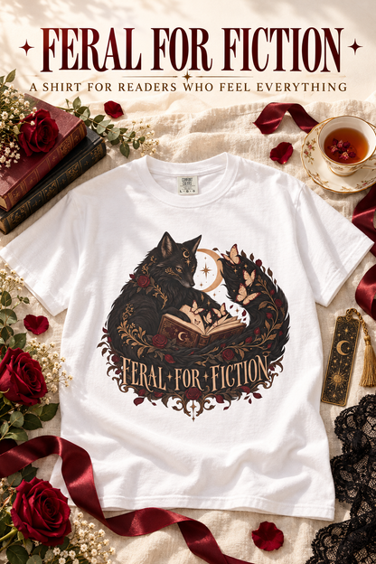 Celebrate your wildest reading obsession with this “Feral for Fiction” Comfort Colors shirt. Featuring two mystical black foxes curled around an open book with burgundy roses, butterflies, stars, and a crescent moon, this gothic book lover tee is perfect for dark romance readers, romantasy fans, BookTok friends, and dark-academia lovers. A unique reader gift for book club, bookstore trips, and cozy reading days.