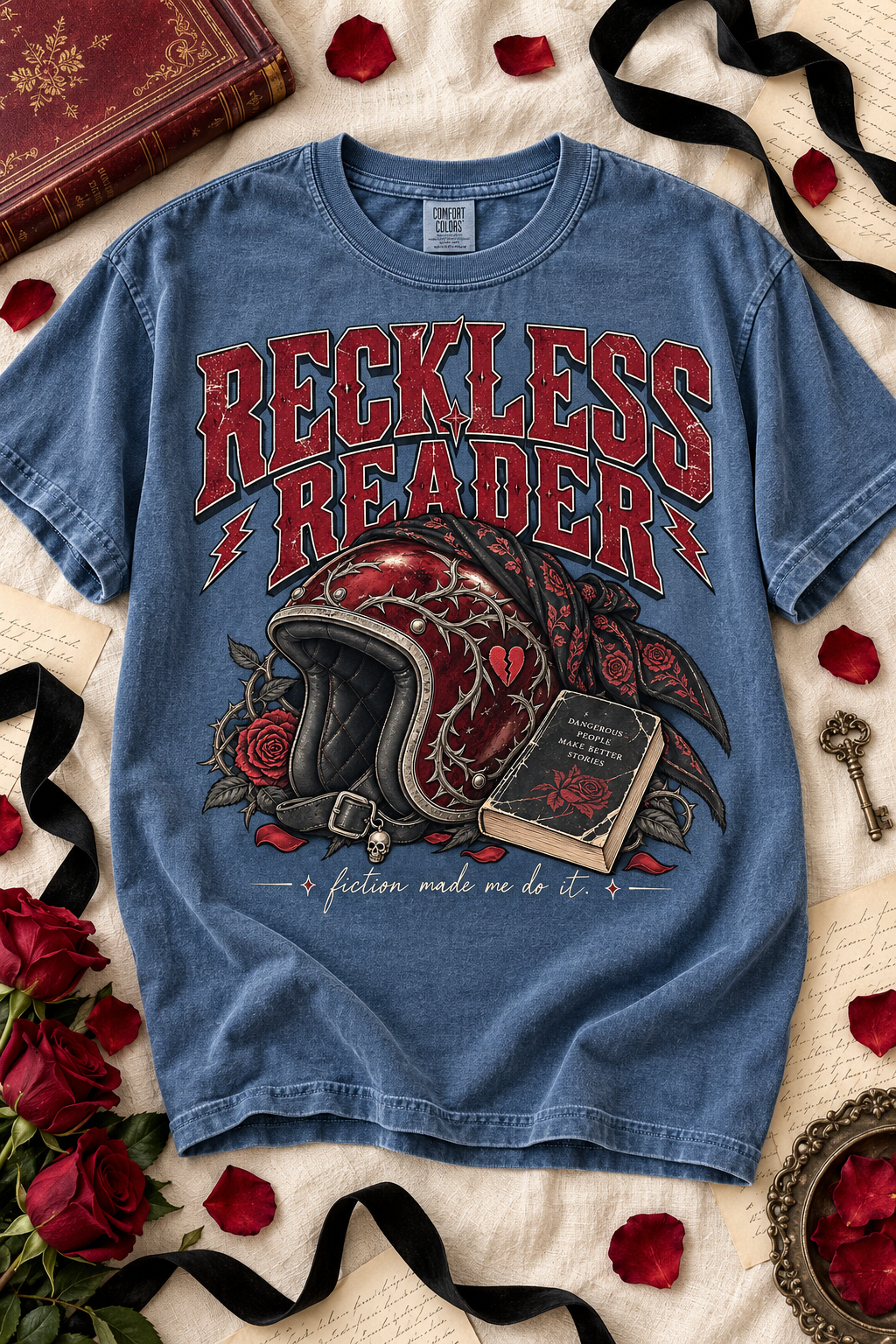 For readers who believe dangerous people make better stories. This “Reckless Reader” Comfort Colors shirt features distressed burgundy lettering, a thorn-covered motorcycle helmet, red roses, a vintage book, and the tagline “fiction made me do it.” Perfect for dark romance, biker romance, romantic suspense, book club, bookstore trips, or gifting to your favorite reckless reader. #DarkRomance #BookLoverGift #BookishShirt