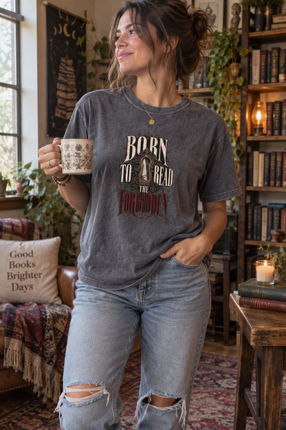 Born to read the forbidden—and emotionally prepared for none of it. This gothic Comfort Colors shirt features an ornate keyhole, moonlit fantasy world, celestial details, and dark florals. A striking gift for dark romance readers, romantasy lovers, BookTok fans, and anyone drawn to dangerous characters and forbidden stories. Available in Ivory, White, Butter, Moss, Pepper, and Blue Jean. #DarkRomance #Romantasy #BookLoverGift