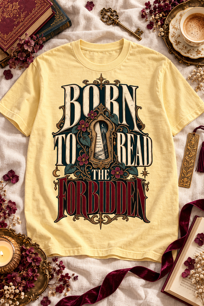 Born to read the forbidden—and emotionally prepared for none of it. This gothic Comfort Colors shirt features an ornate keyhole, moonlit fantasy world, celestial details, and dark florals. A striking gift for dark romance readers, romantasy lovers, BookTok fans, and anyone drawn to dangerous characters and forbidden stories. Available in Ivory, White, Butter, Moss, Pepper, and Blue Jean. #DarkRomance #Romantasy #BookLoverGift