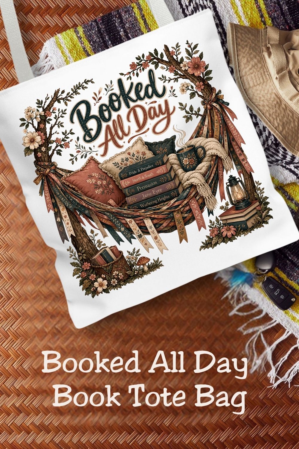 Carry your next adventure wherever you go. 📖👜 The Booked All Day tote bag is perfect for library trips, bookstore hauls, book club meetings, and everyday errands. Featuring a cozy reading hammock, stacks of classic books, coffee, florals, and lanterns, this literary tote is a must-have for readers who always have room for one more book.

#BookedAllDay #BookLoverTote #LibraryBag #BookTokGift #ReaderBag #RomanceReader #BookClub #BookishAccessories #LiteraryGift #Bookworm