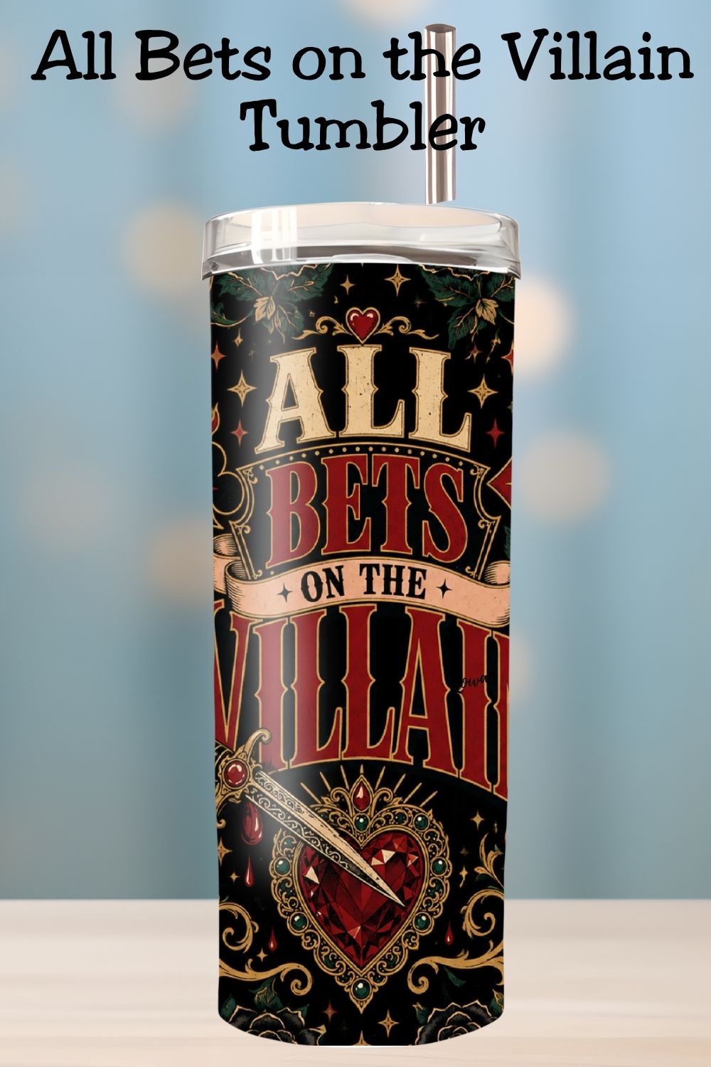 Hydration, but make it morally questionable. 🖤♥️ The All Bets on the Villain Tumbler features a bold gothic wrap with fiery card suits, black roses, cherries, ornate gold flourishes, a dagger, and a jeweled heart against a dramatic black background. Perfect for dark romance readers, romantasy fans, villain lovers, and readers who proudly choose fictional red flags. #BookLoverTumbler #DarkRomance #VillainEra #AllBetsOnTheVillain #RomantasyReader #BookTokGift #ReaderLife #BookishGift
