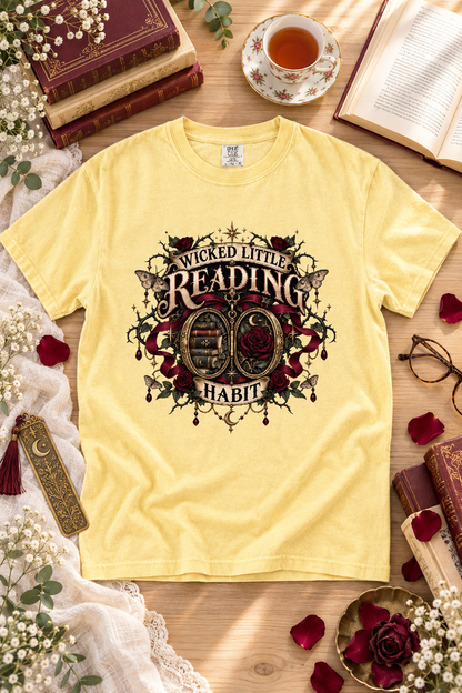 Show off your wicked little reading habit with this gothic book lover shirt featuring antique books, burgundy roses, moths, ribbons, celestial details, and ornate vintage flourishes. This soft Comfort Colors tee makes a fun gift for romance readers, romantasy fans, BookTok friends, librarians, writers, and book club members. Perfect for bookstore trips, library visits, author events, reading retreats, or cozy weekends with your TBR.